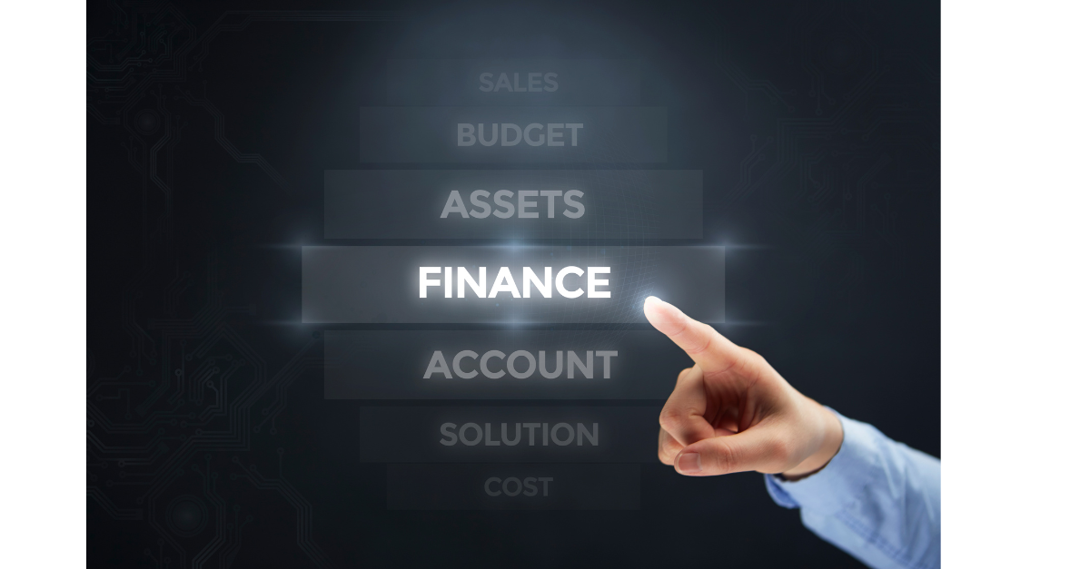 A man is pointing at a screen that says finance and you can see on the rotation that there is also other words including, account and assessts.