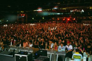 A large event full of people and event staff.