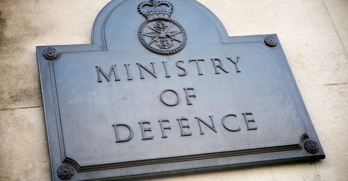 The ministry of defence sign on a wall.