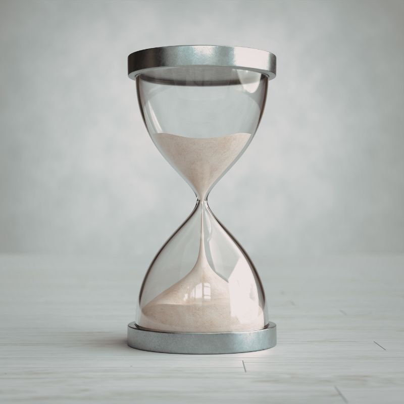 A sand timer with half send in each side.